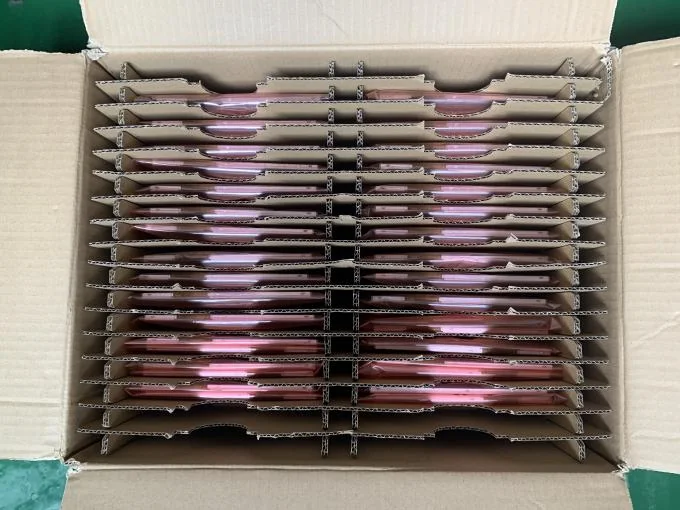 Display modules packed in dividers inside an export carton